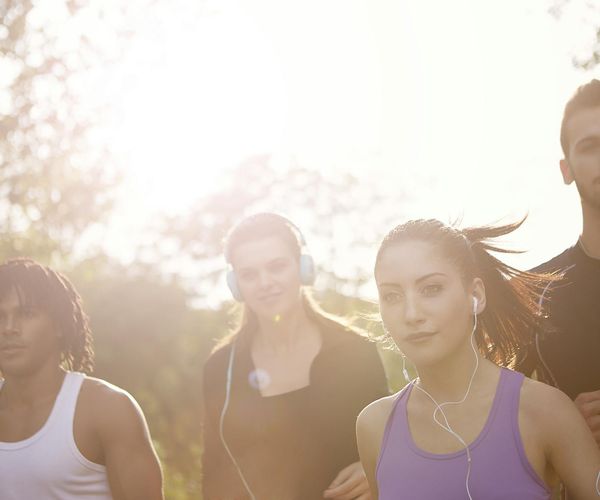 Group of diverse women smiling during a light activity.